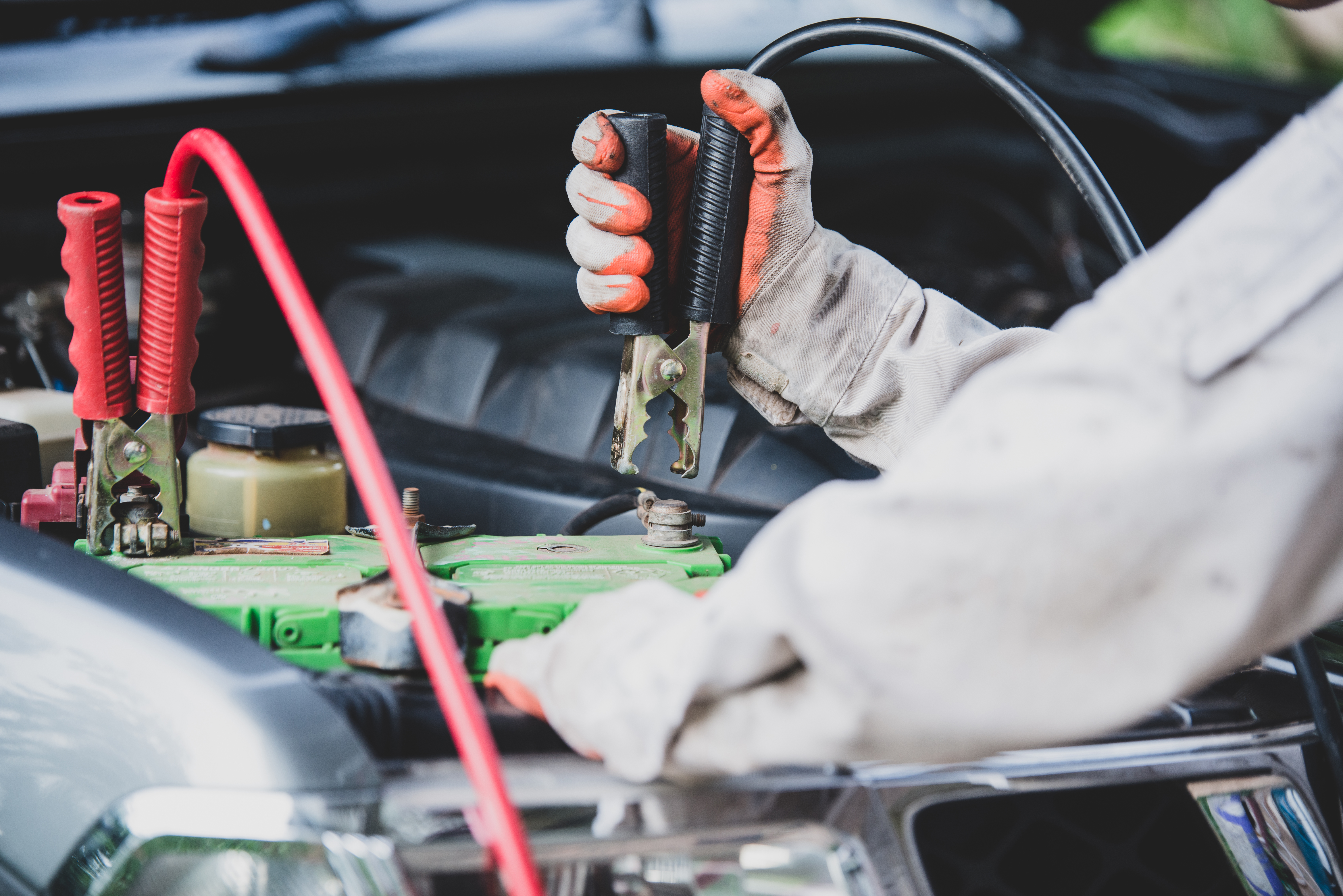 car-repairman-wearing-white-uniform-standing-holding-wrench-that-is-essential-tool-mechanic.jpg