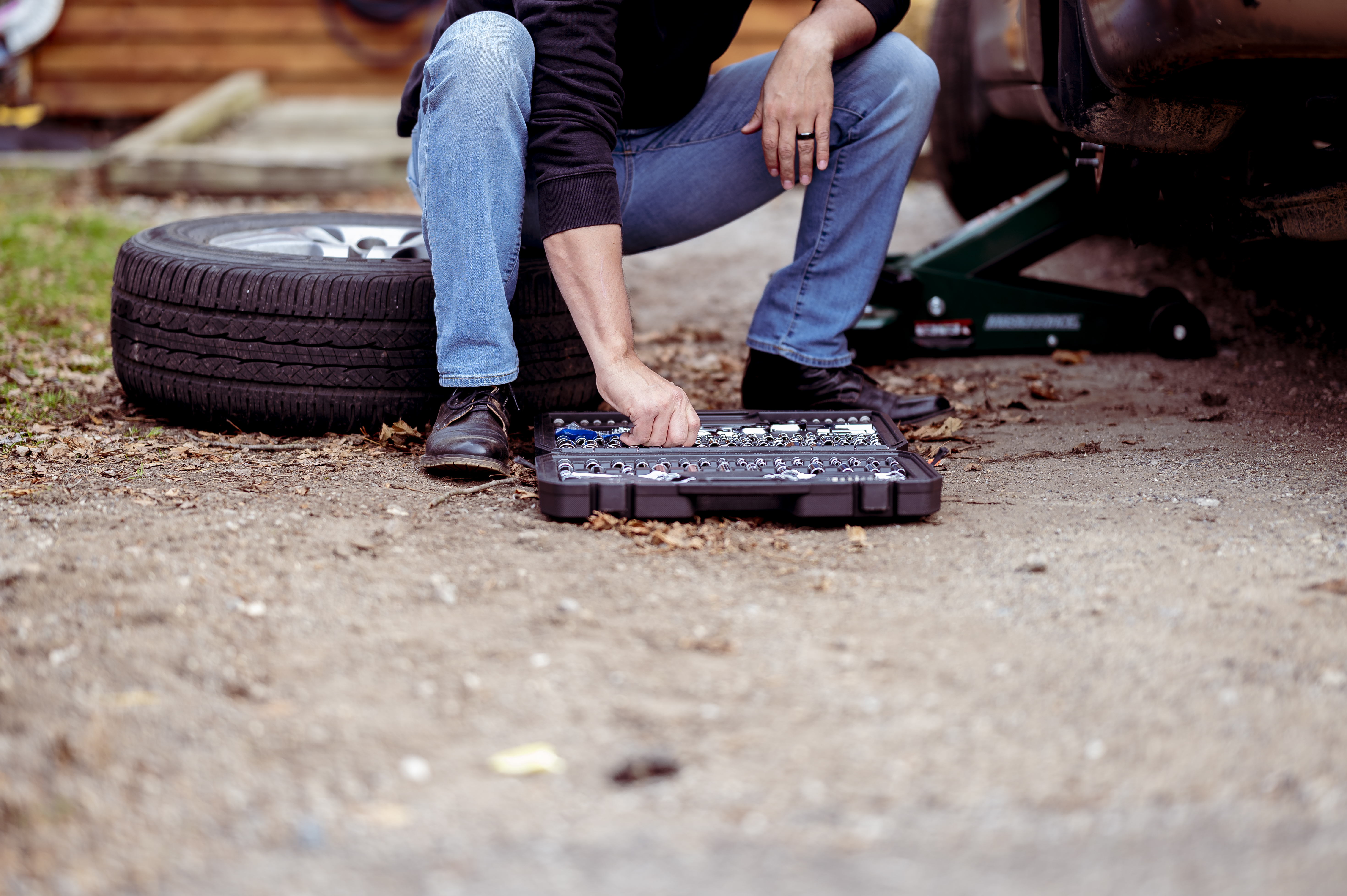 mechanic-with-tools-repairing-car.jpg